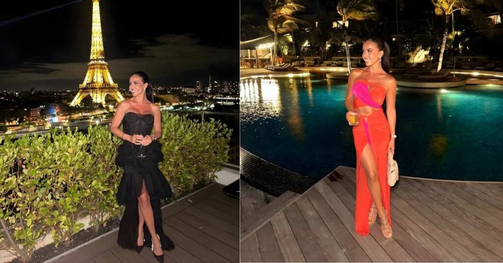 A person in a black dress stands on a balcony at night, with the illuminated Eiffel Tower in the background and the city lights of Paris spread out below.