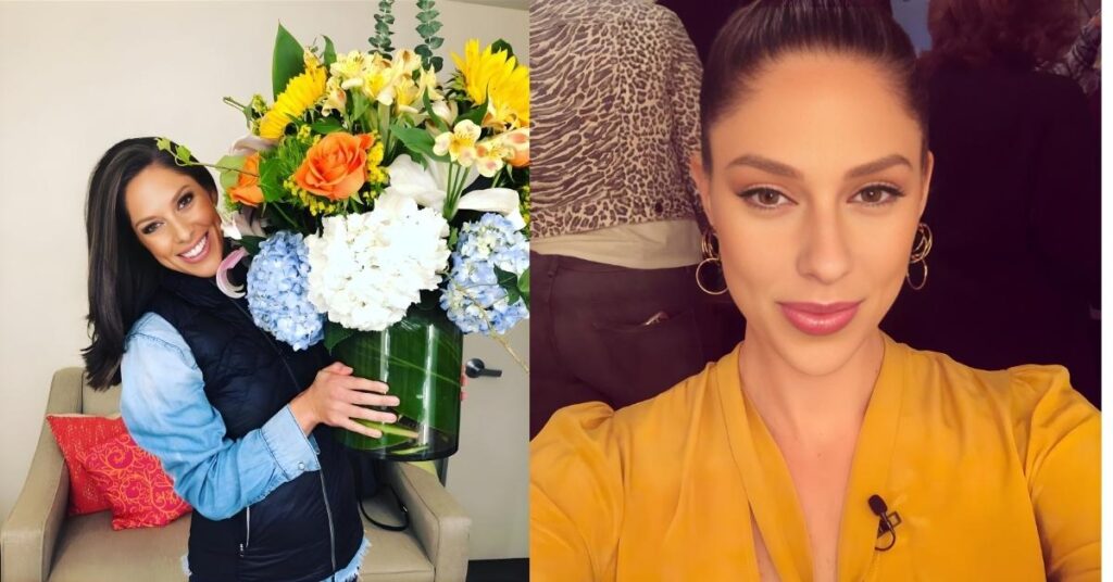 A person smiles while holding a large flower arrangement of sunflowers, hydrangeas, and roses.