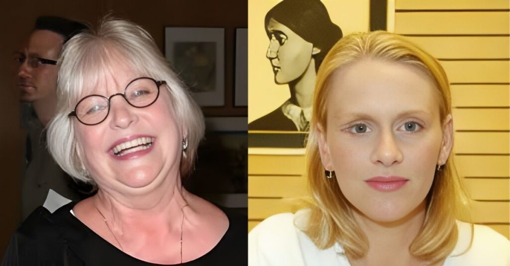 Andrea Martin, with short white hair and glasses, smiles broadly, with her head tilted back. She is wearing a black top and a necklace.