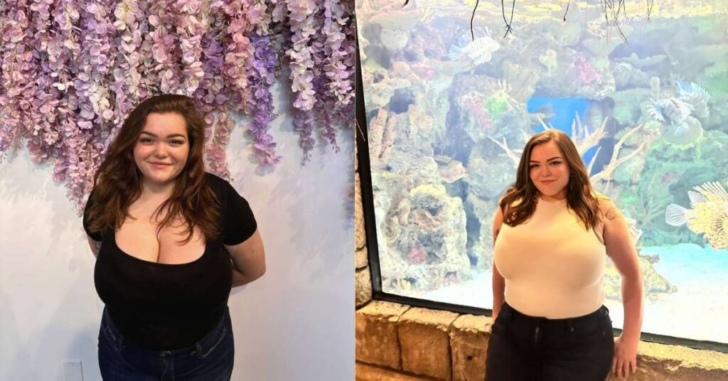 Bonnie Chapman stands in front of a large aquarium filled with coral, rocks, and fish.