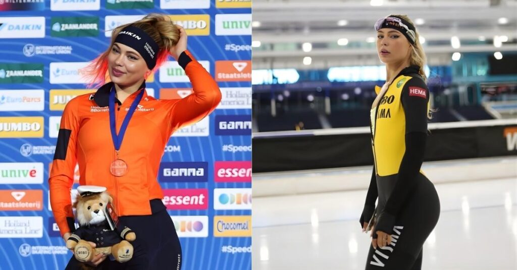 Jutta Leerdam skater in an orange suit and a medal around her neck, holds a stuffed lion wearing a sailor uniform, standing against a backdrop of sponsor logos.