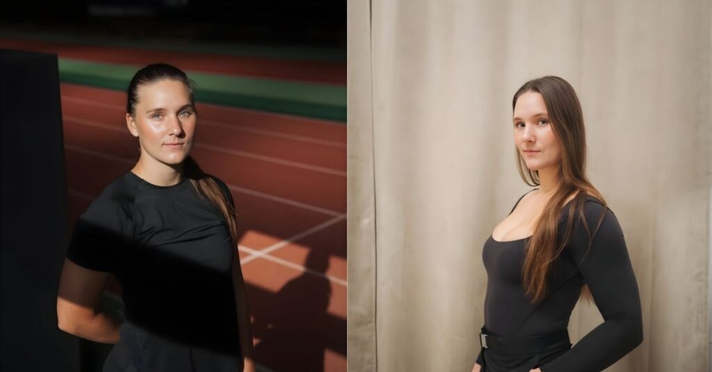 Lisa Buckwitz, wearing a dark gray long-sleeved top and black pants, stands against a beige backdrop.