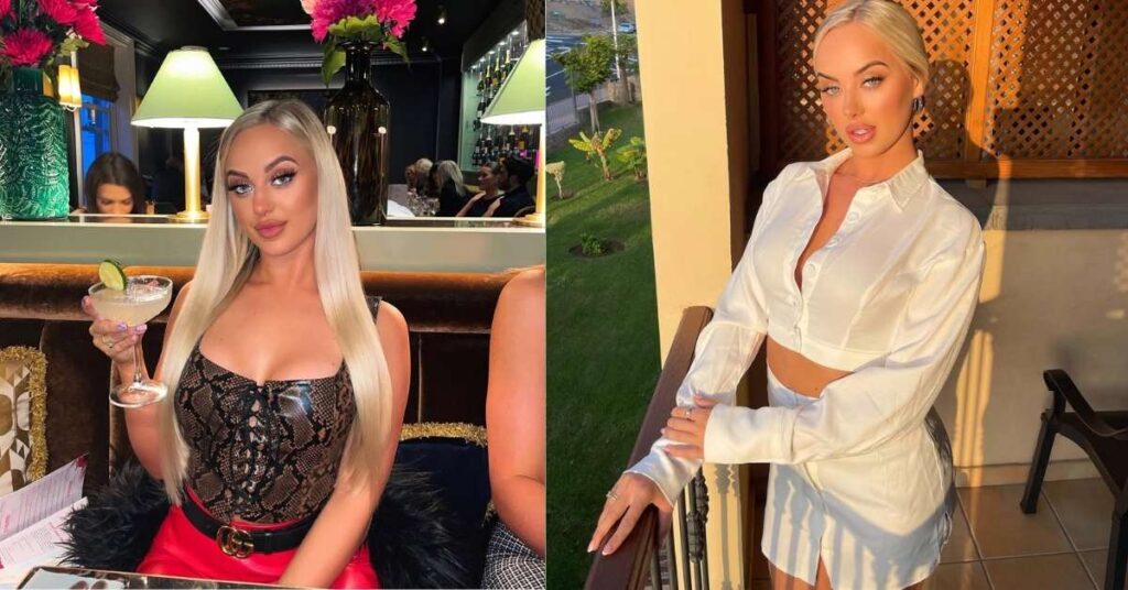 Rhiannon Blue wearing a white button-up crop top and skirt stands on a balcony with a patterned screen behind them.