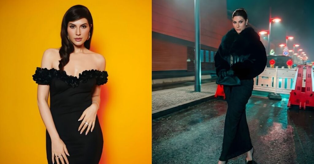 A person in a black off-the-shoulder dress with floral accents stands against a bright yellow background.