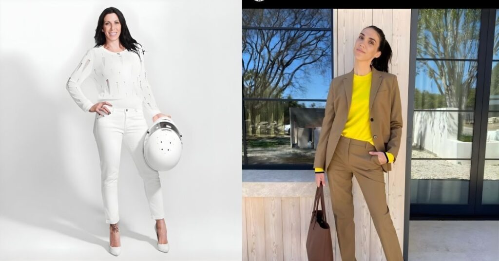 Alexis DeJoria, in all white clothing, including a ripped sweater, jeans, and heels, holds a white helmet in their right hand.