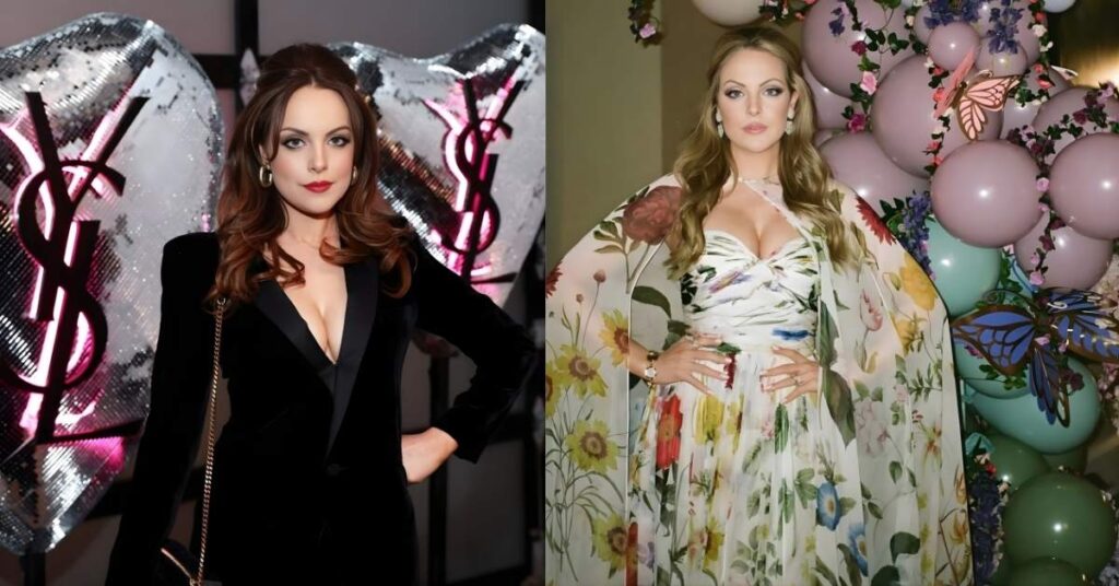 Elizabeth Gillies, in a black velvet tuxedo jacket and pants, poses in front of large silver balloons with a pink Yves Saint Laurent logo.