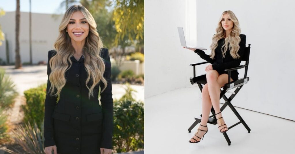 Hannah Hammond, with long blonde hair, wearing a black outfit and high heels, sits on a director's chair holding a laptop.