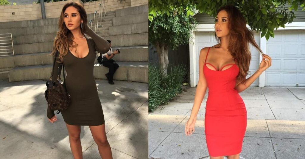 Catherine Paiz is wearing a tight red dress with spaghetti straps and stands outdoors in front of a garage door.