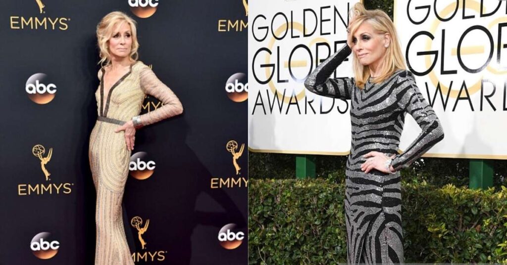 Judith Light, wearing a sparkly silver and black zebra-striped dress, poses with her hand on her hip and the other hand in her hair.