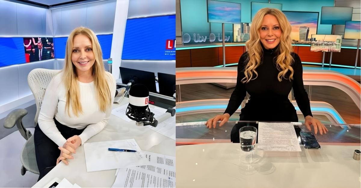 Carol Vorderman sits at a desk in a broadcast studio with a microphone in front of them. They are wearing a white long-sleeved shirt and black pants.
