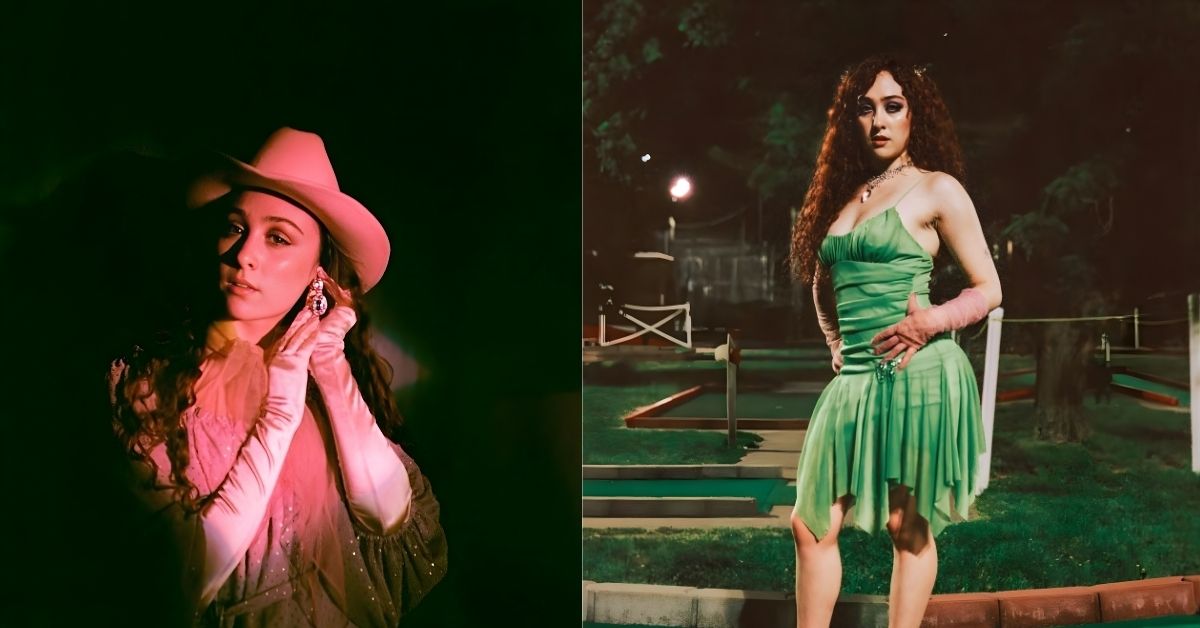 Chappell Roan, in a green dress and pink gloves, stands on a mini golf course at night.