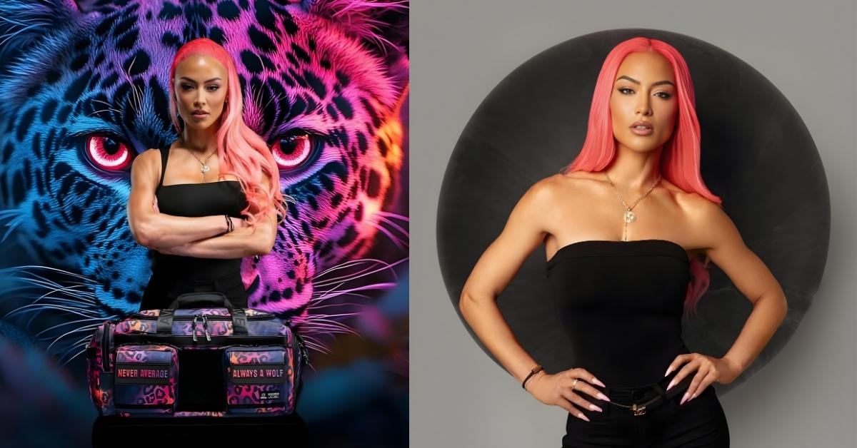 Natalie Eva Maris, with bright pink hair, wears a black strapless top and black pants, with hands on hips, against a grey background and a large black disc.