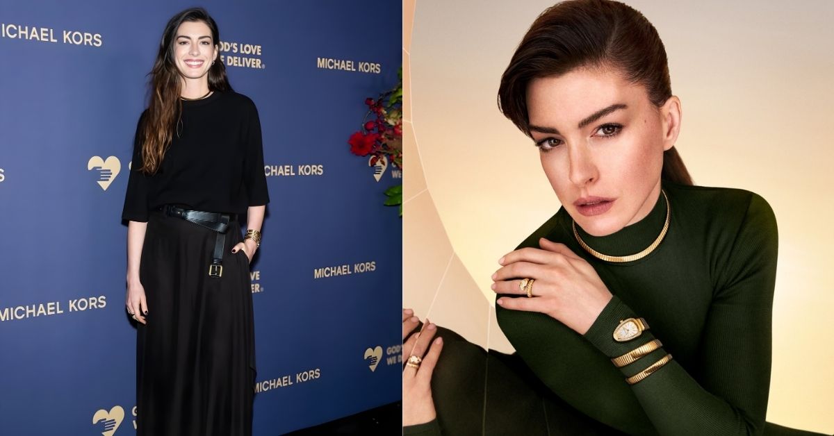 Anne Hathaway is wearing a dark green turtleneck, a gold choker necklace, a gold ring, and multiple gold bracelets, including a watch with a white face.